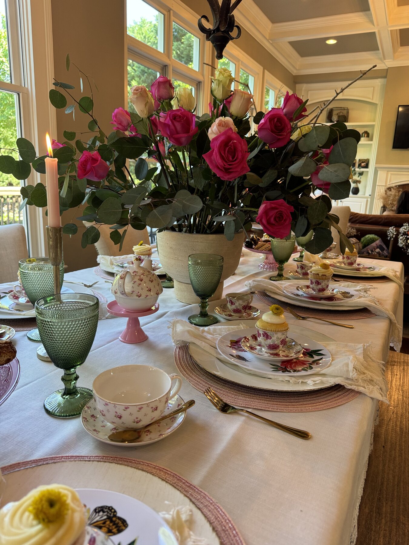 Floral dining table with patterned china and layered color